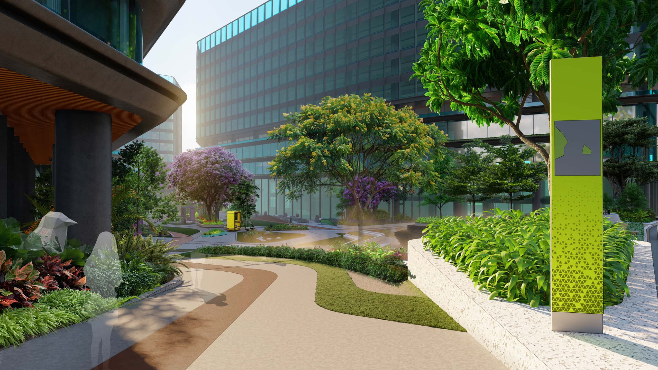 Landscaped central spine courtyard between glass office towers